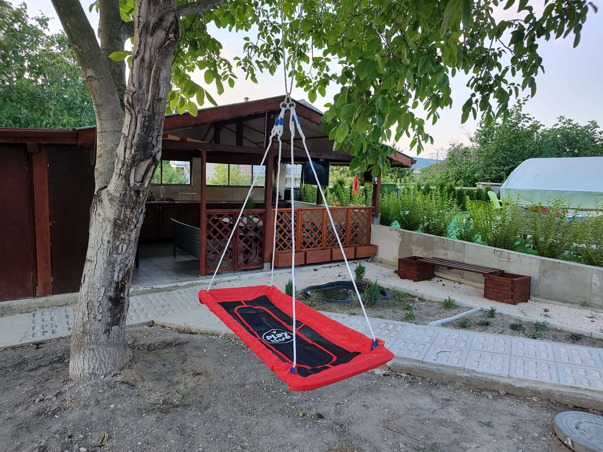 Outdoor Kitchen Pavilion with swing